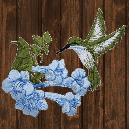 embroidered iron on sew on patch hummingbird blue left with flower