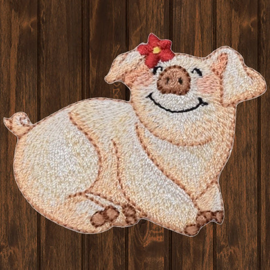 embroidered iron on sew on patch pig sitting right flower chldrens