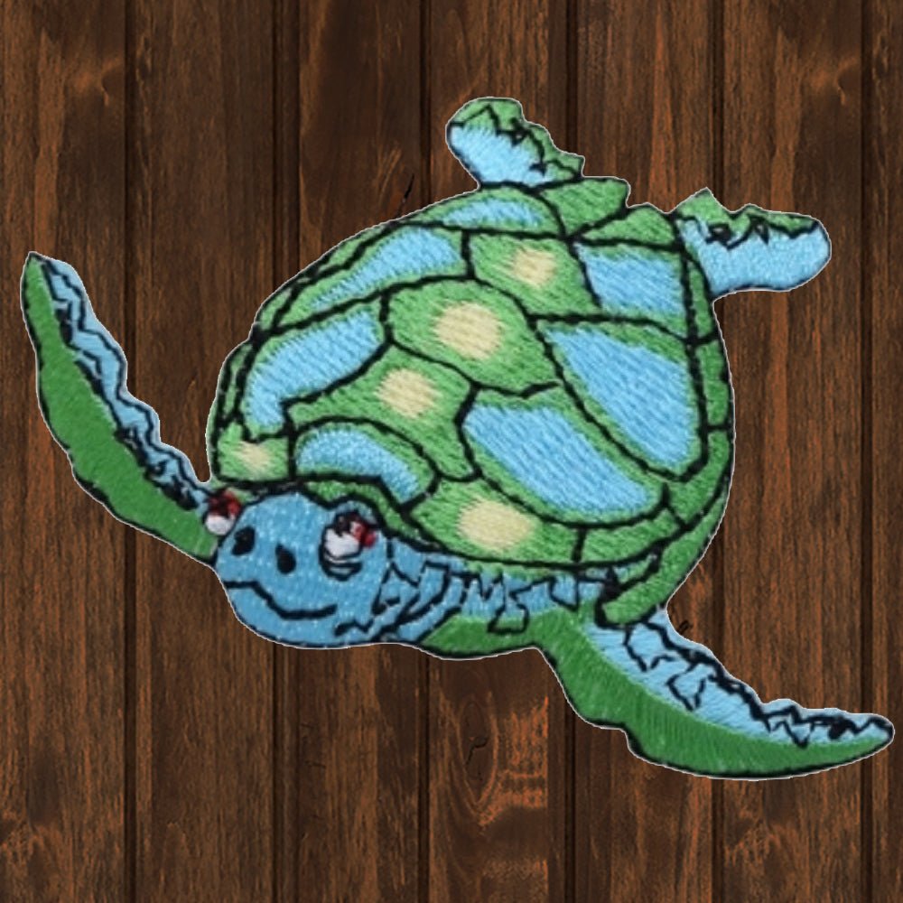 embroidered iron on sew on patch sea turtle facing left